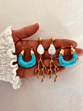 Load image into Gallery viewer, Add a pop of color to your summer look with these bold and stylish chunky resin hoop earrings! Available in vibrant blue or classic white, these lightweight hoops are crafted from durable, waterproof stainless steel for all-day wear. Perfect for vacations, beach days, or everyday outfits, they’re your new go-to statement accessory!