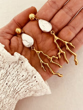Load image into Gallery viewer, Elevate your summer style with these stunning handmade statement earrings, featuring a bold combination of a lustrous natural freshwater pearl and a striking coral drop. Crafted from gold-plated stainless steel for durability and shine, these lightweight yet eye-catching earrings blend elegance with a touch of coastal charm—perfect for any occasion.