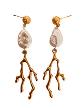 Load image into Gallery viewer, Elevate your summer style with these stunning handmade statement earrings, featuring a bold combination of a lustrous natural freshwater pearl and a striking coral drop. Crafted from gold-plated stainless steel for durability and shine, these lightweight yet eye-catching earrings blend elegance with a touch of coastal charm—perfect for any occasion.