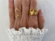 Load image into Gallery viewer, Embrace nature-inspired elegance with this stunning irregular leaf stainless steel ring, designed to make a bold yet refined statement. The ring's unique, asymmetrical leaf design creates an eye-catching, chic look that's perfect for the modern woman who loves to stand out. Crafted from durable, waterproof stainless steel, this trendy piece effortlessly blends creativity with everyday wear. Whether you're styling it for casual outings or adding flair to a more polished ensemble, this ring is the perfect acc