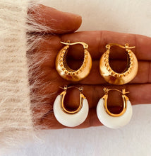 Load image into Gallery viewer, Elevate your everyday style with these chic acrylic white hoop earrings, featuring a delicate gold inner line for a touch of luxe. The small, round design paired with a sturdy stainless steel hoop makes them both stylish and durable. Whether you're dressing up or down, these versatile earrings add a perfect pop of modern elegance to any outfit.