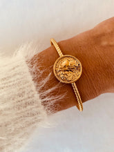 Load image into Gallery viewer, Elevate your everyday style with this classic portrait cuff bracelet, designed for women who love minimalist elegance. Crafted from durable stainless steel with a luxurious 18K gold-plated finish, this open bangle features a timeless portrait design that adds subtle sophistication to any look. Perfect for daily wear or special occasions, it’s a refined fashion accessory and a thoughtful gift with lasting shine.