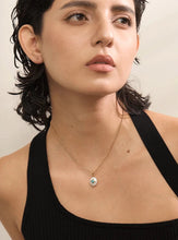 Load image into Gallery viewer, Add a touch of French elegance to your look with this stainless steel natural freshwater pearl necklace, featuring a delicate charm adorned with a turquoise stone at its center. Crafted with premium materials, this stylish piece is both waterproof and hypoallergenic, making it perfect for everyday wear without compromising on luxury. The natural freshwater pearl bring timeless beauty, while the turquoise stone adds a pop of color and a unique flair.