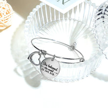 Load image into Gallery viewer, Inspire and empower with this stainless steel creative lettering "She Believed She Could So She Did" charm bangle bracelet. Designed for women and girls who embrace their inner strength, this bohemian-style bracelet features an engraved inspirational message, reminding the wearer of the power of belief and self-love. The sleek stainless steel construction ensures durability and a modern, chic aesthetic that complements any style.