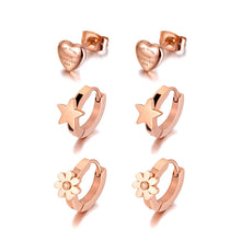 Load image into Gallery viewer, Add a touch of playful elegance to your look with these trendy titanium stainless steel star, heart, and flower charm earrings. This 3-pair set offers versatile designs perfect for any occasion, from casual wear to parties. Crafted for durability and style, these earrings are ideal for women and girls who love charming, eye-catching jewelry that adds a spark of fun to any outfit.
