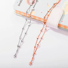 Load image into Gallery viewer, Elevate your style with this popular stainless steel long tassel necklace, featuring an 18K PVD gold plating for a luxurious finish. Its sleek, sweater chain design adds a trendy yet timeless touch to any outfit, making it perfect for layering or wearing alone. Durable and stylish, this personalized fashion piece is ideal for everyday wear or as a thoughtful gift for someone special.