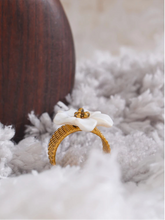 Load image into Gallery viewer, Elevate your style with this thicker natural shell flower open ring, crafted from durable stainless steel with a radiant gold color finish. Featuring a bold yet elegant flower design made from natural shell, this exquisite ring adds a touch of sophistication to any look. Its open, adjustable design ensures a comfortable fit, making it a stylish and waterproof accessory for any occasion. A perfect blend of fashion and elegance!