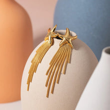 Load image into Gallery viewer, Elevate your style with these stunning stainless steel starfish dangle stud earrings, featuring long, delicate tassel chains and finely detailed starfish charms. Crafted from waterproof stainless steel, they’re perfect for everyday wear, even in humid or wet conditions. Lightweight and comfortable, these earrings add a touch of coastal elegance to any outfit, whether for a beach getaway or a casual day out. Their secure hooks and timeless design make them a versatile accessory for the modern woman.