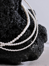 Load image into Gallery viewer, Elevate your everyday elegance with this handmade beaded necklace, featuring non-peeling imitation pearls and a durable stainless steel chain. Designed for both style and longevity, this lightweight and versatile piece adds a touch of sophistication to any outfit. Whether for casual wear or a special occasion, its timeless charm makes it a must-have accessory for any jewelry collection.