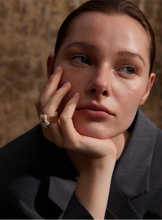 Load image into Gallery viewer, Elevate your style with this thicker natural shell flower open ring, crafted from durable stainless steel with a radiant gold color finish. Featuring a bold yet elegant flower design made from natural shell, this exquisite ring adds a touch of sophistication to any look. Its open, adjustable design ensures a comfortable fit, making it a stylish and waterproof accessory for any occasion. A perfect blend of fashion and elegance!