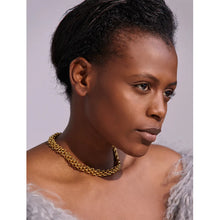 Load image into Gallery viewer, Beautiful statement necklace comes in two colours. It is made of chain in Cuban style and due to its luxurious and glamorous look, it can be worn with daily and evening outfits. It has a size adjustable lobster clasp and can be combined with the bracelet as a set.