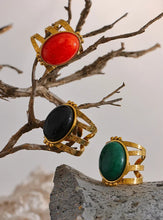 Load image into Gallery viewer, Add a bold touch of color to your ensemble with this eye-catching open adjustable ring, featuring a choice of rich red, black, or green natural stones. Crafted from high-quality stainless steel and plated in radiant gold, this ring combines elegance with everyday practicality—its waterproof finish ensures long-lasting beauty and shine. The open, adjustable design offers a comfortable and versatile fit, making it perfect for women who love versatile yet luxurious accessories.