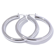 Load image into Gallery viewer, Elevate your style with these minimalistic big hollow hoop earrings, crafted from anti-allergic 316L stainless steel for lasting comfort and durability. Their sleek, round design offers a modern and trendy touch, perfect for adding effortless elegance to any outfit. Lightweight and versatile, these simple yet bold earrings are a must-have accessory for everyday wear or special occasions.