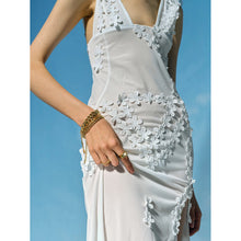 Load image into Gallery viewer, This exquisite stainless steel hollow shell bracelet in radiant 18K gold color is a beautiful blend of elegance and nature-inspired design. Featuring a delicate line of intricately crafted hollow shells, this bracelet is PVD plated for extra durability and a luxurious finish. Its waterproof quality makes it perfect for everyday wear, adding a touch of timeless charm to any outfit.