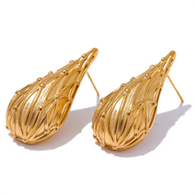 Load image into Gallery viewer, Add a touch of elegance to your look with these fashion stainless steel teardrop stud earrings. Featuring a sleek water drop design and a modern metal texture, these earrings are both trendy and timeless. Made from anti-allergic stainless steel, they offer comfort and durability, perfect for sensitive ears. Whether for everyday wear or a special occasion, these versatile earrings make a stylish addition to any jewelry collection and a thoughtful gift for someone special.