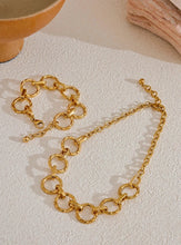 Load image into Gallery viewer, Make a bold style statement with this trendy metal round links chain necklace, featuring oversized, notched links that create a striking and modern look. Crafted from high-quality stainless steel, this necklace is designed to be both waterproof and durable, ensuring it maintains its shine through everyday wear. Its unique, individualistic design makes it the perfect accessory for those who love to stand out with distinctive, fashion-forward pieces.