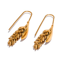 Load image into Gallery viewer, Make a bold personal statement with these stunning stainless steel ear of wheat earrings. Plated in 18K gold, their intricate design symbolizes growth and prosperity, offering a unique touch to any outfit. Water-resistant and crafted for durability, these earrings are perfect for everyday wear or special occasions. A stylish and meaningful addition to your jewelry collection or a thoughtful gift for someone special.