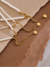 Load image into Gallery viewer, Elevate your everyday elegance with this handmade beaded necklace, featuring non-peeling imitation pearls and a durable stainless steel chain. Designed for both style and longevity, this lightweight and versatile piece adds a touch of sophistication to any outfit. Whether for casual wear or a special occasion, its timeless charm makes it a must-have accessory for any jewelry collection.