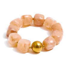 Load image into Gallery viewer, Add a pop of color and personality to your look with this handmade acrylic bead bracelet, featuring a stunning mix of green, beige, pink, and amber tones. Crafted from durable stainless steel and fully waterproof, it’s made to shine with you every day. The bold square beads and modern chain design create a playful yet elegant look that stands out effortlessly. Perfect for stacking, gifting, or wearing solo, this bracelet brings a touch of fun, color, and sophistication to any outfit.