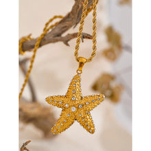 Load image into Gallery viewer, This stunning long necklace, crafted from stainless steel, features a striking starfish pendant that exudes summer elegance. The pendant is beautifully embellished with sparkling cubic zirconia, adding a radiant touch of glamour and sophistication. Perfect for elevating any summer outfit, this necklace effortlessly enhances your look with a hint of coastal charm and eye-catching sparkle. Designed for both style and practicality, it features a secure lobster clasp and an adjustable length.