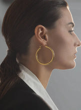 Load image into Gallery viewer, Elevate your style with these minimalistic big hollow hoop earrings, crafted from anti-allergic 316L stainless steel for lasting comfort and durability. Their sleek, round design offers a modern and trendy touch, perfect for adding effortless elegance to any outfit. Lightweight and versatile, these simple yet bold earrings are a must-have accessory for everyday wear or special occasions.