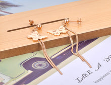 Load image into Gallery viewer, Add graceful elegance to your look with these trendy stainless steel butterfly charm earrings. Featuring delicate long chain tassels, these animal-inspired earrings bring a touch of sparkle and sophistication to any outfit. Perfect for women who love chic, nature-themed jewelry, they’re an ideal accessory for both everyday wear and special occasions.