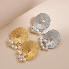 Load image into Gallery viewer, Add a touch of romance to your look with these exquisite French-inspired earrings. Featuring irregular hammered stainless steel circles with elegant hanging pearls, they blend vintage charm with modern sophistication. Perfect for weddings, anniversaries, or special occasions, these earrings make a timeless statement and a thoughtful gift for someone special.