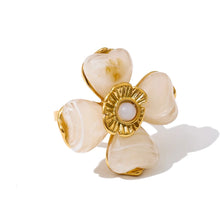 Load image into Gallery viewer, Add a touch of whimsy to your look with this playful acrylic flower ring, featuring a vibrant multi-color design and a bold floral shape. Crafted from waterproof stainless steel, it's as durable as it is stylish—and fully adjustable for a comfortable, custom fit. Perfect for adding a fun pop of color to any outfit, this trendy ring is made to shine all year round.