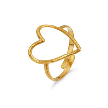 Load image into Gallery viewer, Fall in love with the effortless charm of this stainless steel hollow heart ring — a minimalistic statement piece with a romantic twist. Featuring a sleek open design and a delicate heart-shaped cutout, this ring blends Western-inspired style with modern simplicity. Available in both polished silver and radiant gold finishes, it's the perfect accessory for adding a subtle touch of elegance to your everyday look or party outfit. Durable, waterproof, and endlessly versatile, it also makes a thoughtful gift th