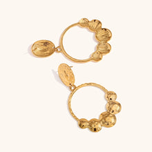 Load image into Gallery viewer, Elevate your style with these punch pattern round pendant earrings, crafted from premium stainless steel for a sleek and durable finish. Featuring an intricate punched design, these luxurious earrings add a touch of elegance to any outfit. Waterproof and lightweight, they are perfect for both everyday wear and special occasions. A sophisticated accessory and a thoughtful gift for any stylish woman!