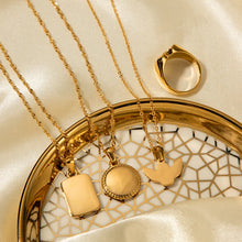 Load image into Gallery viewer, This vintage-inspired angel necklace features a delicate pendant in the shape of an angel, crafted from waterproof, rust-proof stainless steel and plated in luxurious 18K gold. Designed for everyday wear, it combines durability with classic elegance, making it a versatile piece for any occasion. With its timeless charm and meaningful design, this necklace effortlessly complements any outfit, adding a touch of sophistication and grace to your daily jewelry collection.