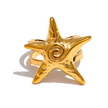 Load image into Gallery viewer, Embrace the essence of summer with this stainless steel starfish open ring, a playful and elegant accessory perfect for your holiday look. 18K gold plated for a luxurious finish, this adjustable ring features a charming starfish design that brings a touch of the ocean to your style. Crafted for durability and comfort, it’s an ideal piece for those who love personalized, summer-inspired jewelry.