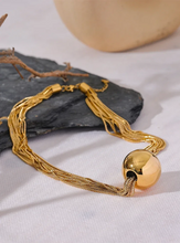 Load image into Gallery viewer, Make a bold statement with this trendy layered overlay chain necklace, featuring a sleek round ball pendant for a modern touch. Crafted from durable stainless steel, this waterproof design offers both style and versatility, perfect for any occasion. Its layered look adds depth and sophistication, making it an eye-catching accessory for those who love personalized, fashion-forward jewelry.