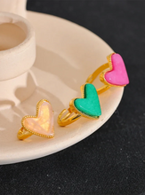 Load image into Gallery viewer, Add a playful touch to your style with this candy sweet natural stone heart open ring. Crafted from stainless steel and plated in real gold, this adjustable ring features a charming heart-shaped natural stone centerpiece, evoking the fun and vibrant energy. Its open design ensures a comfortable, custom fit, making it perfect for everyday wear or as a standout accessory for special occasions.