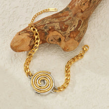 Load image into Gallery viewer, Elevate your style with this elegant stainless steel bracelet, featuring a sleek dual-color design in gold and silver. Accented with a chic disc pendant, this minimalist yet sophisticated piece is perfect for everyday wear or special occasions. Its timeless charm and personalized touch make it a thoughtful gift for any woman who loves effortless fashion.