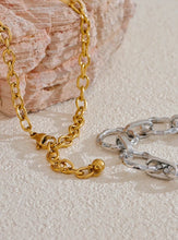 Load image into Gallery viewer, Make a bold style statement with this trendy metal round links chain necklace, featuring oversized, notched links that create a striking and modern look. Crafted from high-quality stainless steel, this necklace is designed to be both waterproof and durable, ensuring it maintains its shine through everyday wear. Its unique, individualistic design makes it the perfect accessory for those who love to stand out with distinctive, fashion-forward pieces.