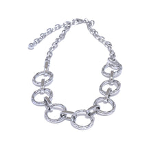 Load image into Gallery viewer, Make a bold style statement with this trendy metal round links chain necklace, featuring oversized, notched links that create a striking and modern look. Crafted from high-quality stainless steel, this necklace is designed to be both waterproof and durable, ensuring it maintains its shine through everyday wear. Its unique, individualistic design makes it the perfect accessory for those who love to stand out with distinctive, fashion-forward pieces.