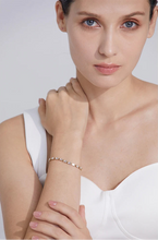 Load image into Gallery viewer, Add a touch of elegance with this waterproof fashion bracelet, featuring dazzling white cubic zirconia set in high-quality stainless steel. Designed for durability and shine, this gorgeous piece exudes sophistication, making it perfect for both everyday wear and special occasions. A timeless accessory that enhances any outfit, it’s a must-have for any jewelry lover.