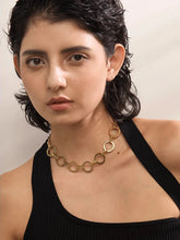 Load image into Gallery viewer, Make a bold style statement with this trendy metal round links chain necklace, featuring oversized, notched links that create a striking and modern look. Crafted from high-quality stainless steel, this necklace is designed to be both waterproof and durable, ensuring it maintains its shine through everyday wear. Its unique, individualistic design makes it the perfect accessory for those who love to stand out with distinctive, fashion-forward pieces.