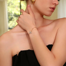 Load image into Gallery viewer, Enhance your elegance with this zircon flower bead chain bracelet, crafted from durable stainless steel for a sleek, waterproof finish. Featuring delicate flower-shaped zircon accents and a chic bead chain design, this bracelet is the perfect blend of sophistication and charm. Ideal for everyday wear or special occasions, it makes a thoughtful high-end gift or a stylish addition to any jewelry collection.