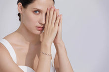 Load image into Gallery viewer, Add a touch of elegance with this waterproof fashion bracelet, featuring dazzling white cubic zirconia set in high-quality stainless steel. Designed for durability and shine, this gorgeous piece exudes sophistication, making it perfect for both everyday wear and special occasions. A timeless accessory that enhances any outfit, it’s a must-have for any jewelry lover.