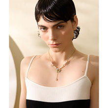 Load image into Gallery viewer, This luxurious necklace is made as a combination of natural freshwater pearls and stainless steel beads. It is additionally adorned with a pendant in the shape of a butterfly, which is also made of stainless steel and natural pearls. There is a short chain under the butterfly with little cubic zirconia. The necklace is very glamorous and it will give a perfect touch to your evening combination. The necklace has lobster clap and adjustable length.