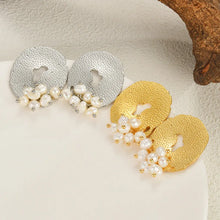 Load image into Gallery viewer, Add a touch of romance to your look with these exquisite French-inspired earrings. Featuring irregular hammered stainless steel circles with elegant hanging pearls, they blend vintage charm with modern sophistication. Perfect for weddings, anniversaries, or special occasions, these earrings make a timeless statement and a thoughtful gift for someone special.