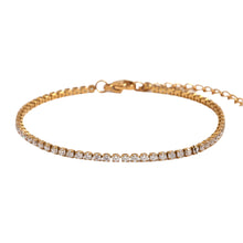 Load image into Gallery viewer, Elevate your style with this luxurious gold plated tennis bracelet, featuring dazzling AAA-grade zircon stones for a radiant sparkle. Crafted from durable stainless steel, this trendy bracelet combines elegance and durability, making it perfect for everyday wear or special occasions. A timeless accessory that adds a touch of sophistication to any outfit, it’s a must-have for any jewelry collection or a thoughtful gift for someone special.