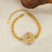 Load image into Gallery viewer, Elevate your style with this elegant stainless steel bracelet, featuring a sleek dual-color design in gold and silver. Accented with a chic disc pendant, this minimalist yet sophisticated piece is perfect for everyday wear or special occasions. Its timeless charm and personalized touch make it a thoughtful gift for any woman who loves effortless fashion.
