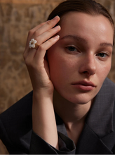 Load image into Gallery viewer, Elevate your style with this thicker natural shell flower open ring, crafted from durable stainless steel with a radiant gold color finish. Featuring a bold yet elegant flower design made from natural shell, this exquisite ring adds a touch of sophistication to any look. Its open, adjustable design ensures a comfortable fit, making it a stylish and waterproof accessory for any occasion. A perfect blend of fashion and elegance!