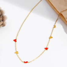 Load image into Gallery viewer, Charming gold plated stainless steel necklace comes in a gold colour. It is adorned with irregular shaped hearts in red and gold combination. This necklace is a perfect piece for any daily or evening outfit. It is also a great present for your loved ones. The necklace has a lobster clasp and adjustable length.