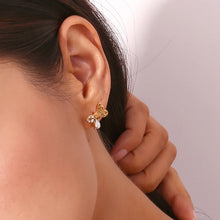 Load image into Gallery viewer, Add a touch of whimsy to your look with these asymmetric mini butterfly earrings, beautifully inlaid with sparkling zirconium. Crafted from durable stainless steel, these earrings are waterproof and perfect for daily wear. Their unique design exudes elegance and charm, making them a stylish accessory or a thoughtful gift for any occasion.