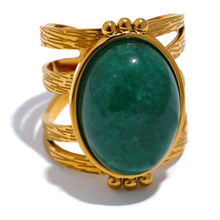 Load image into Gallery viewer, Add a bold touch of color to your ensemble with this eye-catching open adjustable ring, featuring a choice of rich red, black, or green natural stones. Crafted from high-quality stainless steel and plated in radiant gold, this ring combines elegance with everyday practicality—its waterproof finish ensures long-lasting beauty and shine. The open, adjustable design offers a comfortable and versatile fit, making it perfect for women who love versatile yet luxurious accessories.