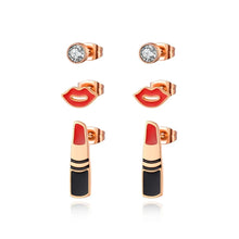 Load image into Gallery viewer, Add a playful touch to your style with this trendy stainless steel lips & lipstick earrings set. Featuring three unique pairs adorned with sparkling cubic zirconia crystals, these earrings are perfect for women who love fun and fashionable jewelry. Lightweight and durable, they effortlessly combine charm and versatility, making them a stylish choice for any occasion or a delightful gift.